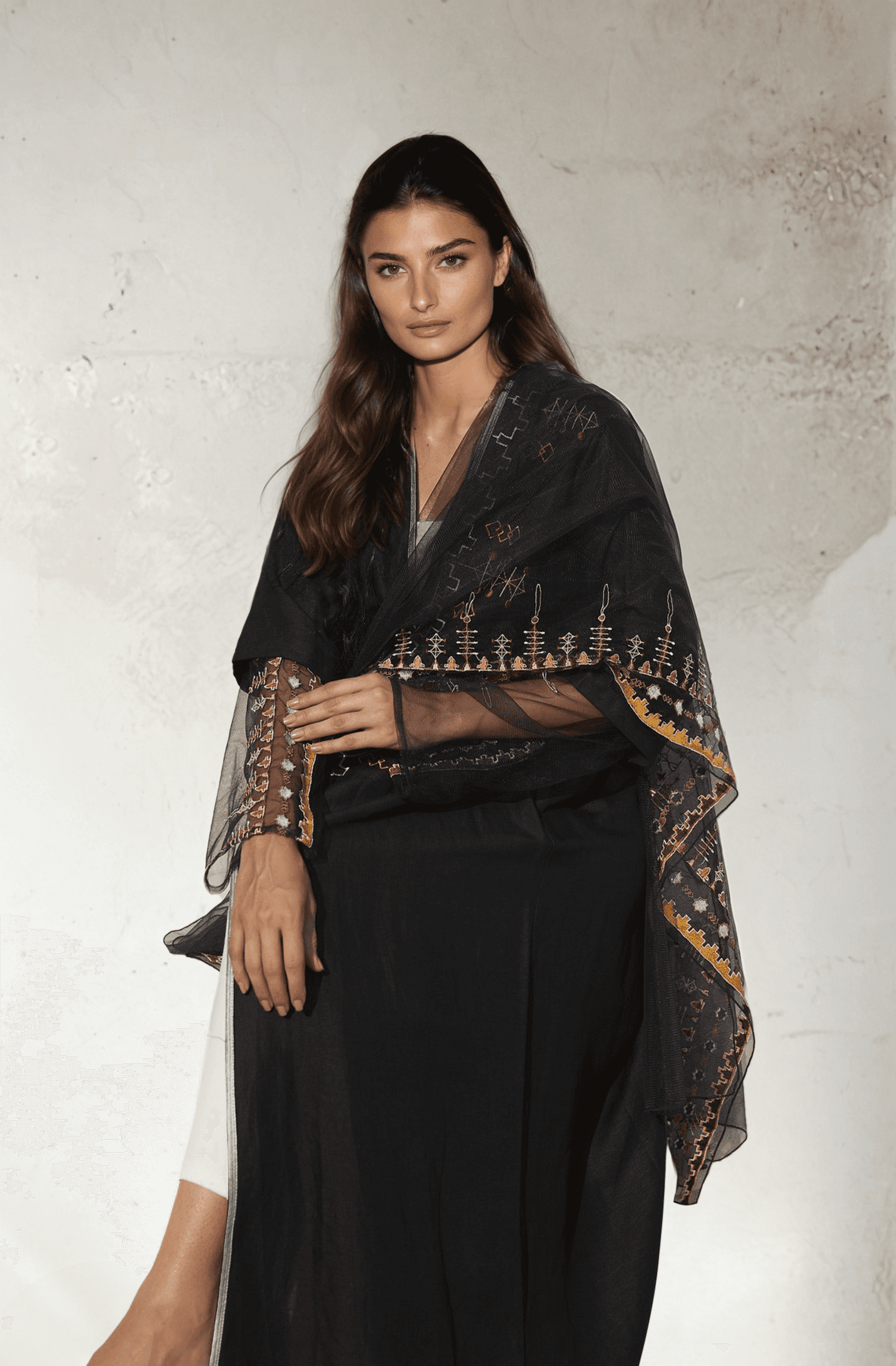 Saudi Abaya & Scarf Set featuring sheer black fabric with intricate gold and copper embroidery, blending heritage with timeless style.