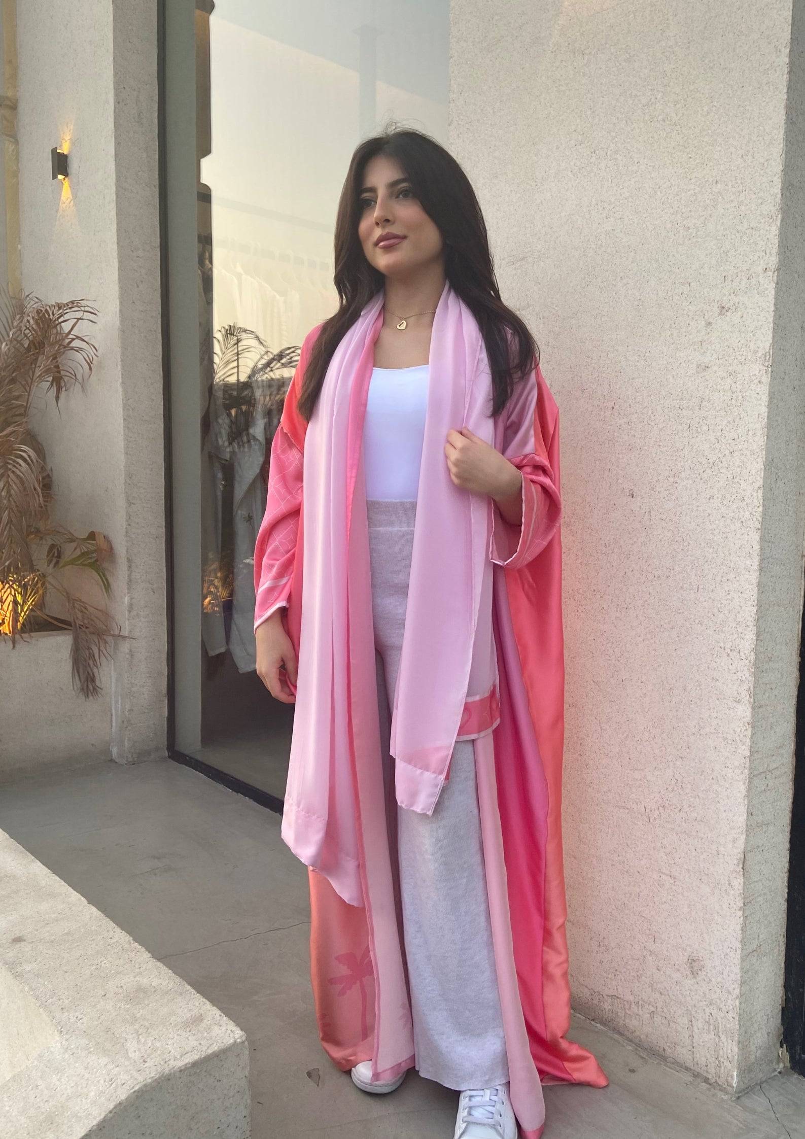 Barbie-Inspired Pink Abaya Set styled with white sneakers and innerwear, perfect for a modern twist on traditional attire.