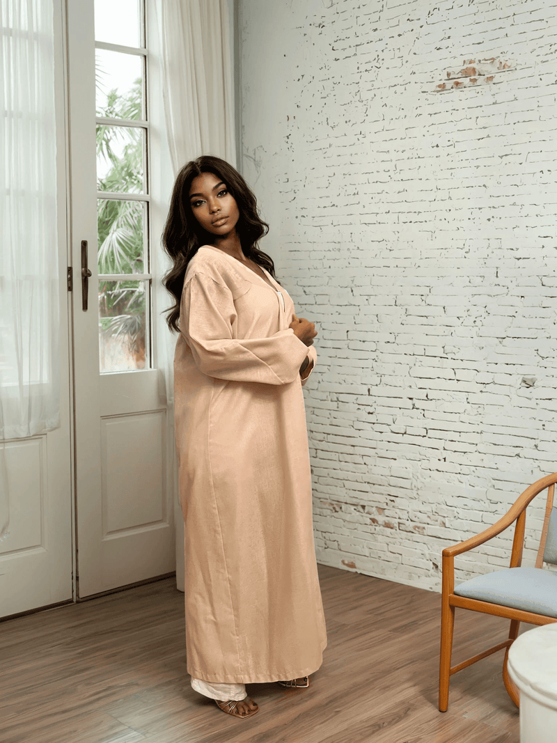 Rosé Gold Abaya - Breast Cancer Awareness | Solidarity, Hope. Back view of rose gold abaya showcasing its graceful silhouette and soft fabric.