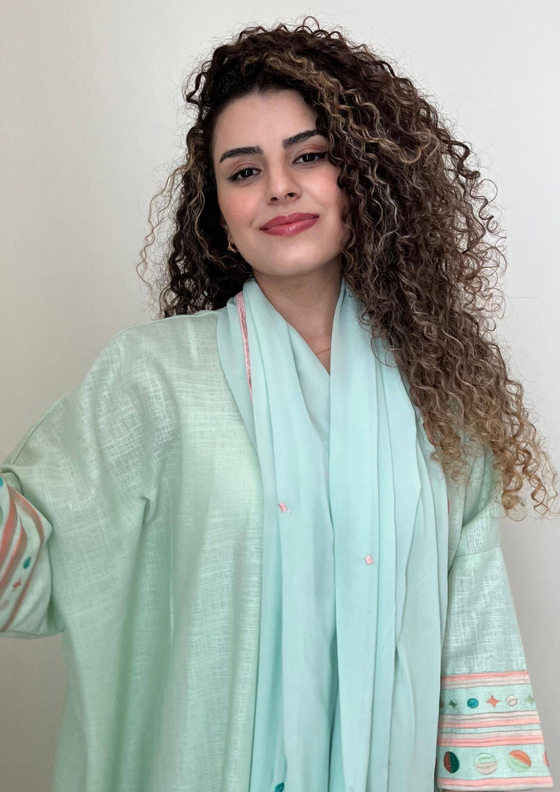 Front view of Birthday Abaya & Scarf Set in cold mint, styled with soft scarf and pastel embroidery for summer elegance.