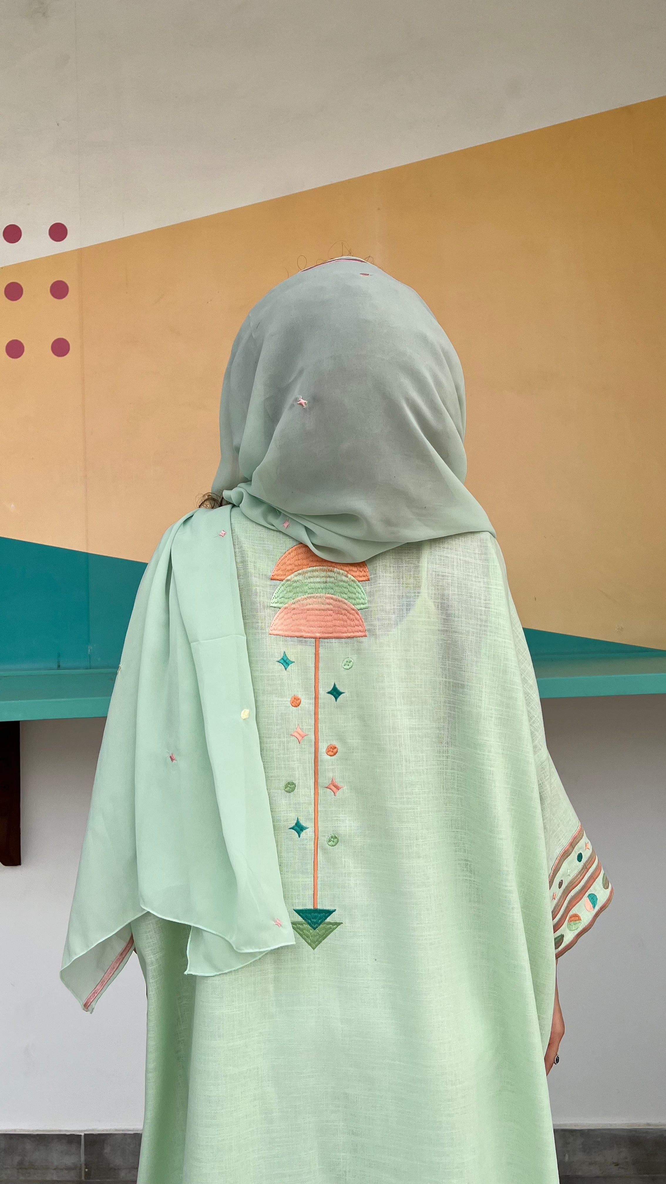 Back view of Birthday Abaya & Scarf Set in cold mint, featuring geometric embroidery and soft draping scarf.