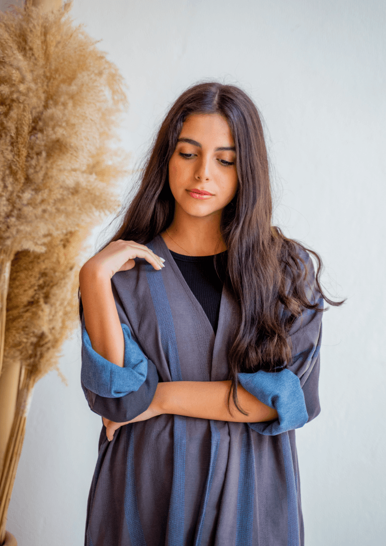 Close-up of The WORKaholic Abaya - Daily Wear in grey with blue accents, showcasing soft fabric texture and relaxed fit.