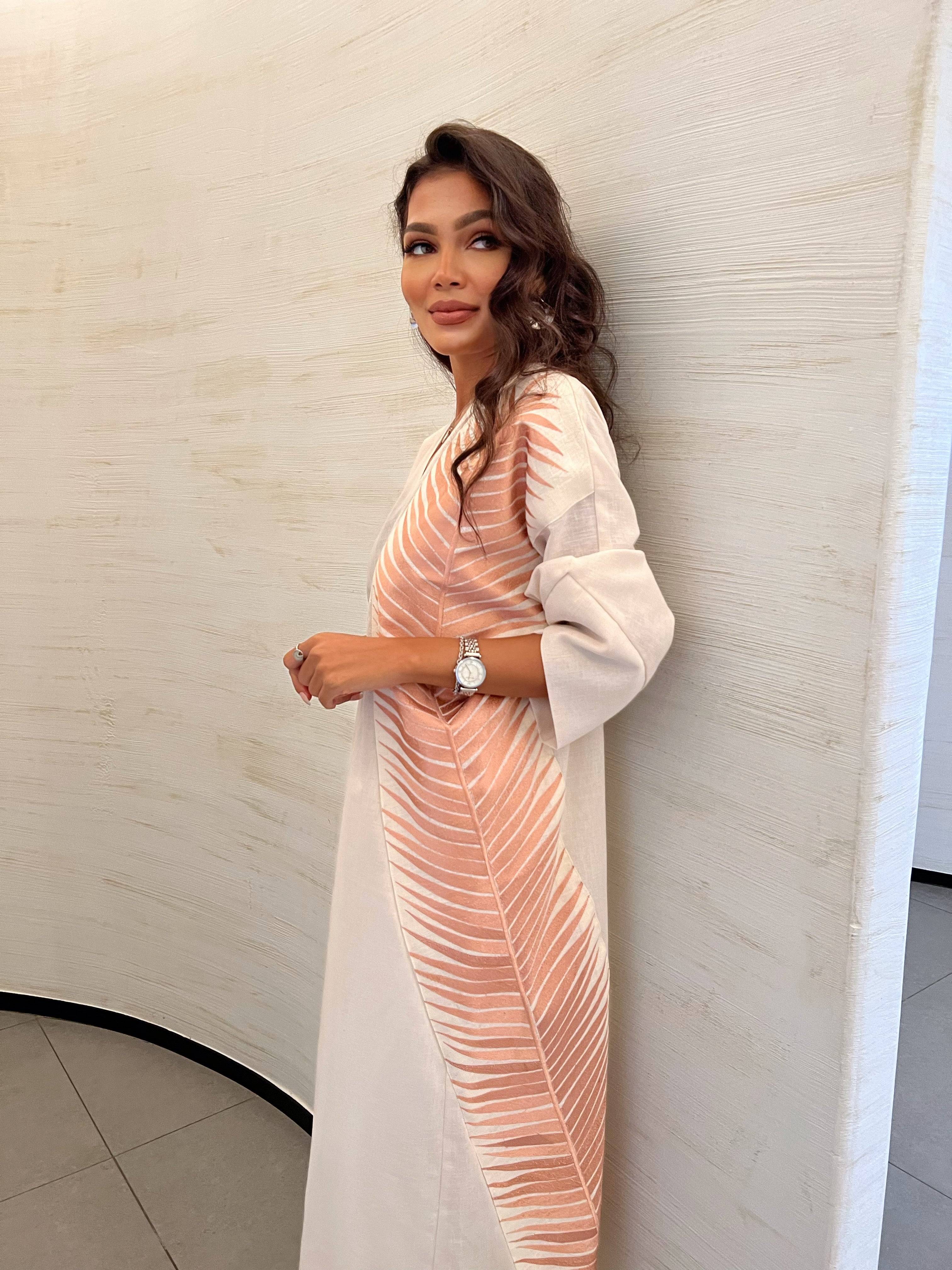 Rosé Gold Abaya - Breast Cancer Awareness | Solidarity, Hope. Side profile of abaya with bold rose gold leaf pattern, blending fashion and advocacy.