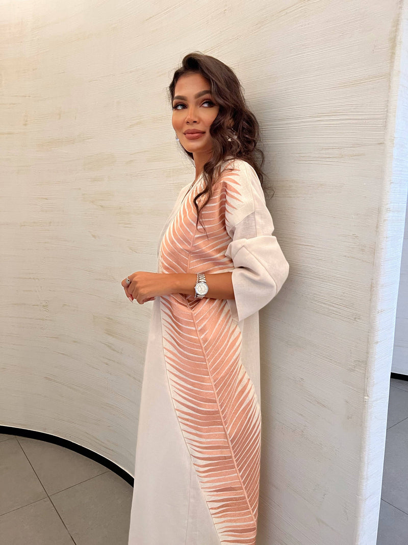 Rosé Gold Abaya - Breast Cancer Awareness | Solidarity, Hope. Side profile of abaya with bold rose gold leaf pattern, blending fashion and advocacy.