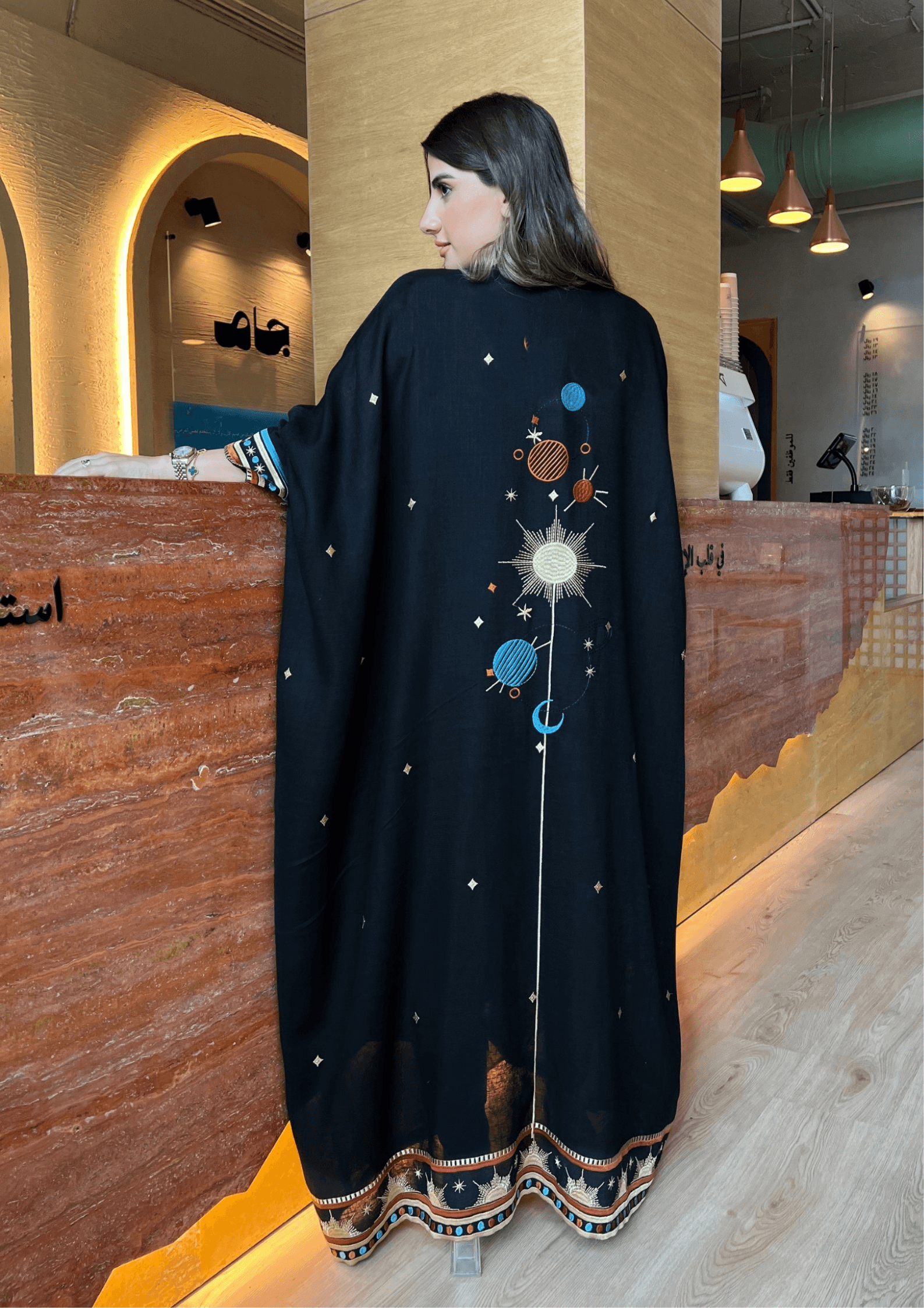 Full back view of Distant Galaxies - Show Stopper Back Abaya with galaxy embroidery, combining elegance and cosmic inspiration for special events.