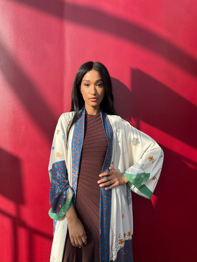 The Untitled Project – Seen Leaving the Corniche abaya, colorful matte silk resortwear designed in Saudi Arabia and shipped worldwide.