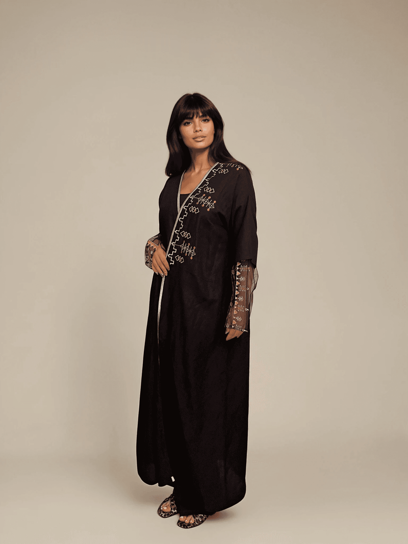 Elegant Saudi Abaya & Scarf Set in black with traditional embroidery on sleeves and chest, ideal for ceremonial and cultural wear.