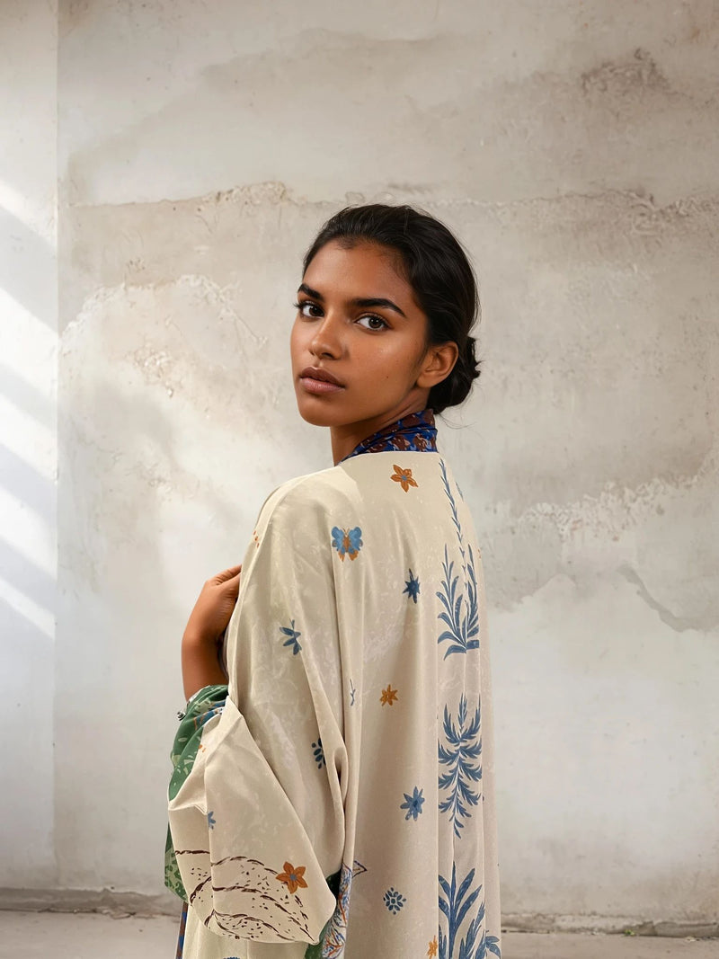 Resortwear abaya with artistic multicolor print – Seen Leaving the Corniche by The Untitled Project, sustainable design available in the UK and US.