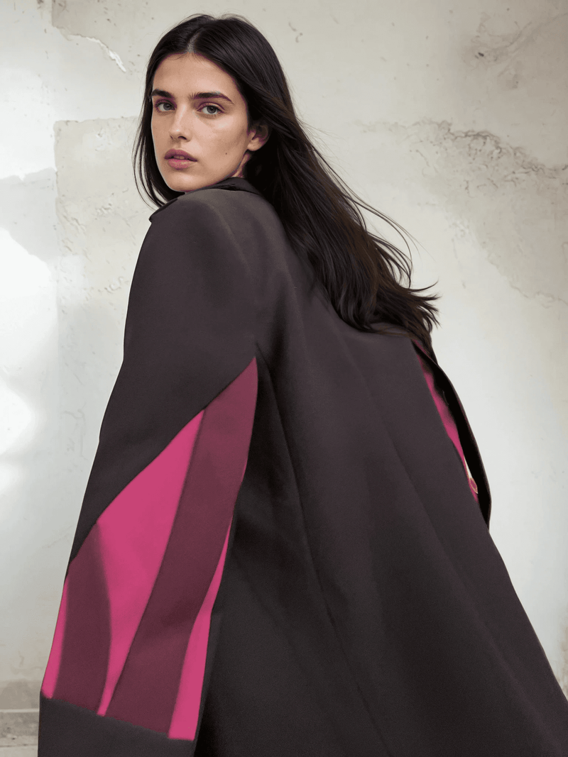 Over-the-shoulder view of The Front Row Feeling - Long Blazer, highlighting the bold magenta sleeve panels and luxe crepe texture.