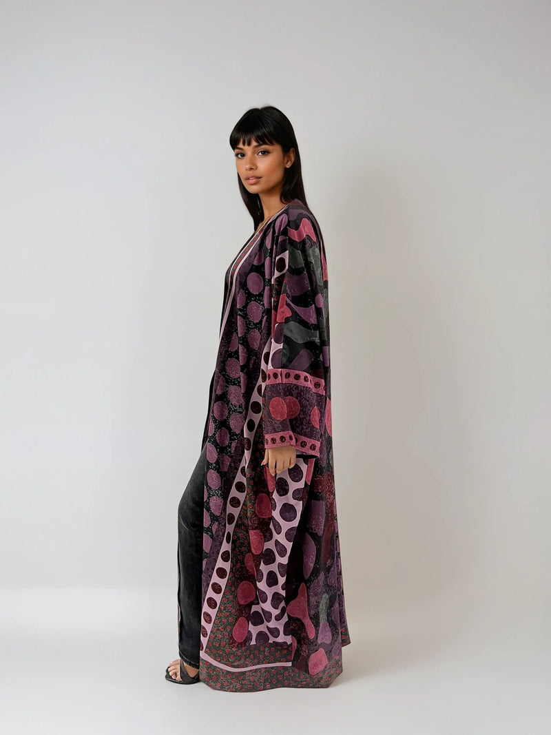 Soft purple polka dot abaya in matte silk — breathable and elegant resortwear by The Untitled Project Saudi.