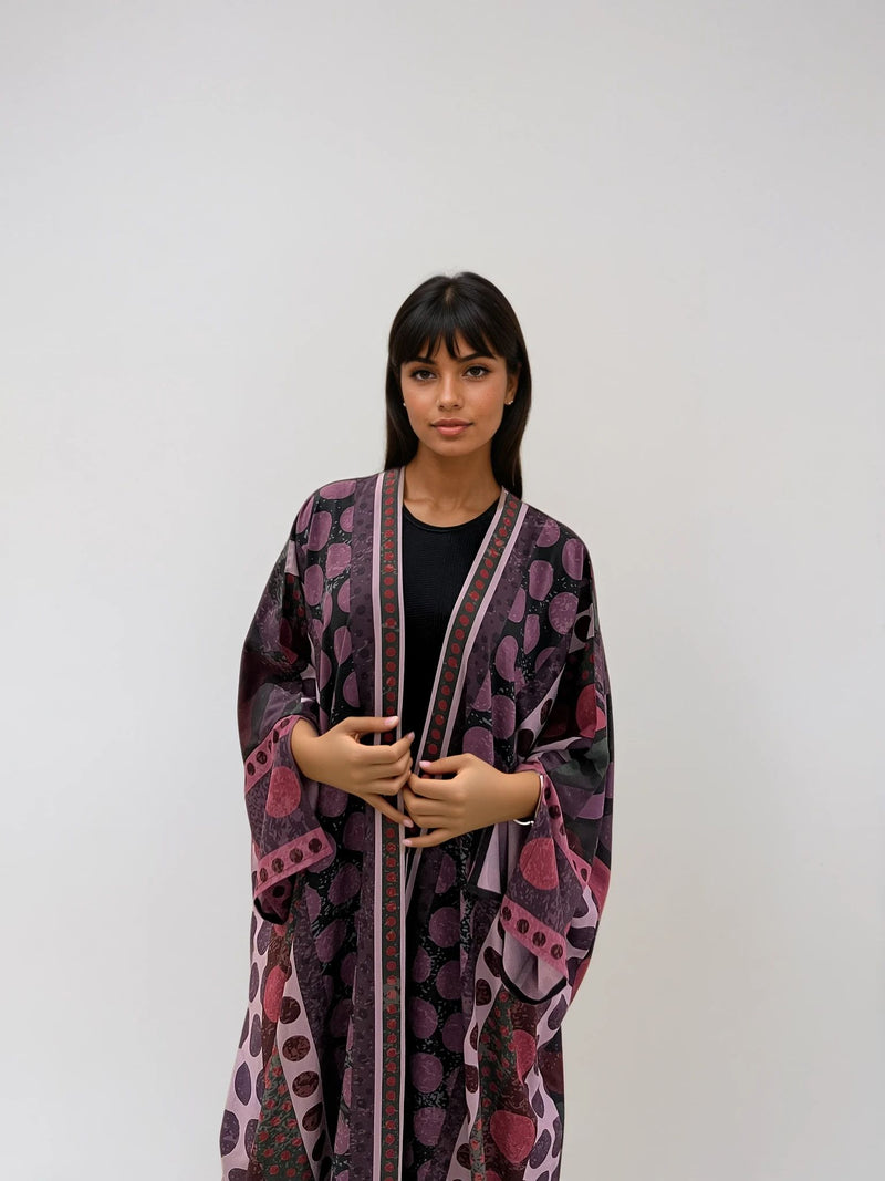 Resortwear abaya in purple matte silk with playful polka dot detailing — A Polka Thought by The Untitled Project Saudi.