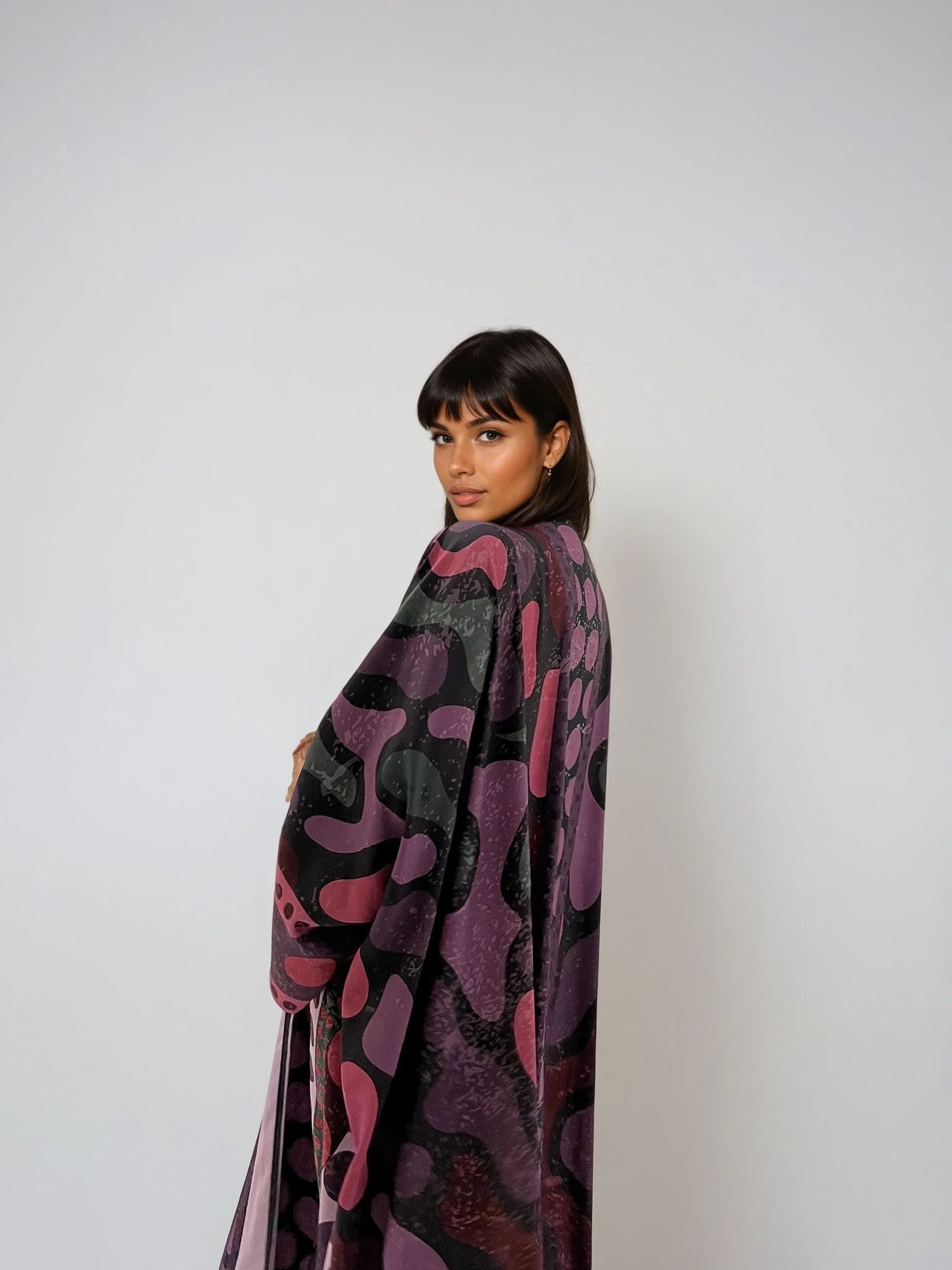 A Polka Thought abaya — sustainable silk piece printed from the inside, perfect for warm weather.