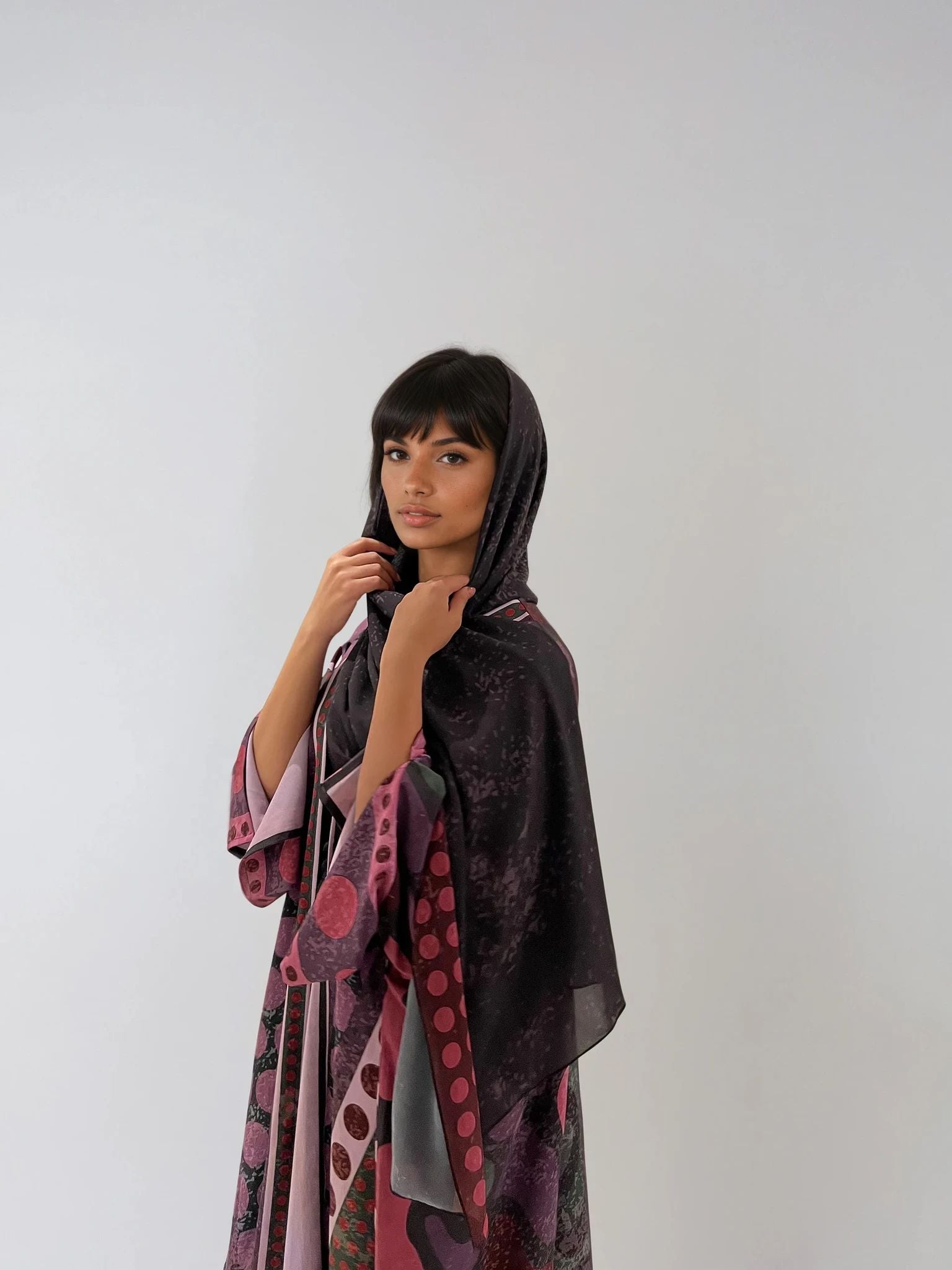 Sustainable fashion from The Untitled Project — purple matte silk abaya featuring internal print and soft drape.