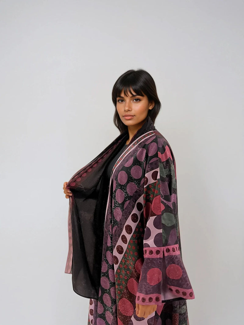 Sustainable fashion from The Untitled Project — purple matte silk abaya featuring internal print and soft drape.