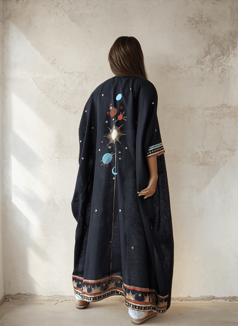 Distant Galaxies - Show Stopper Back Abaya featuring celestial embroidery and colorful planetary motifs on the back, perfect for elegant occasions.