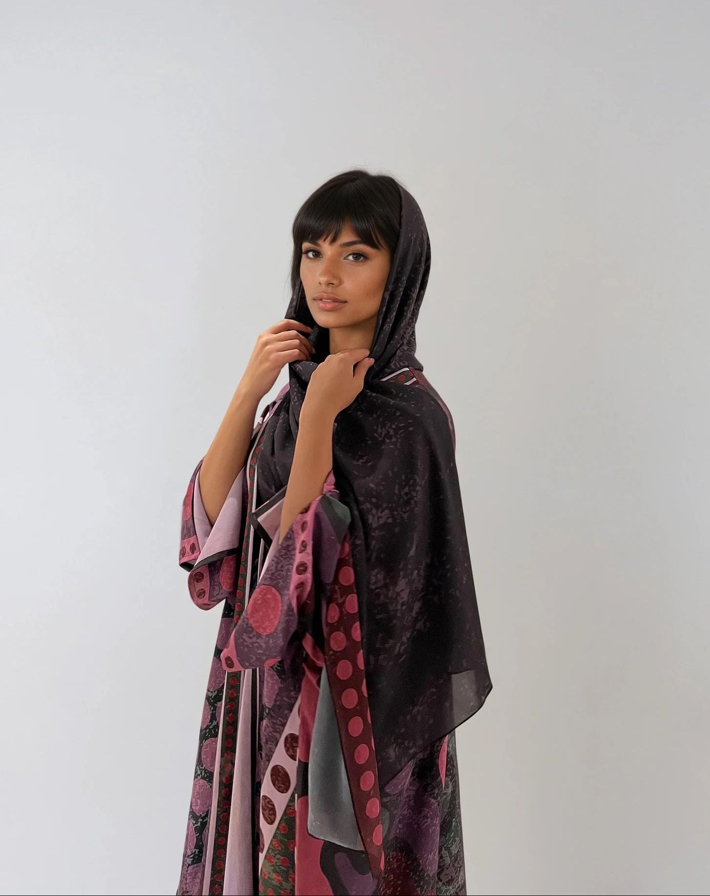 Sustainable fashion from The Untitled Project — purple matte silk abaya featuring internal print and soft drape.