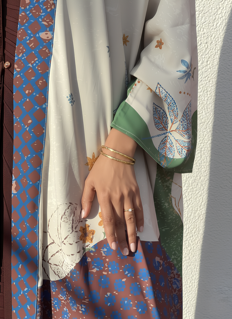 Luxury printed silk abaya and scarf set – Seen Leaving the Corniche by The Untitled Project, inspired by Saudi coastal color palettes.