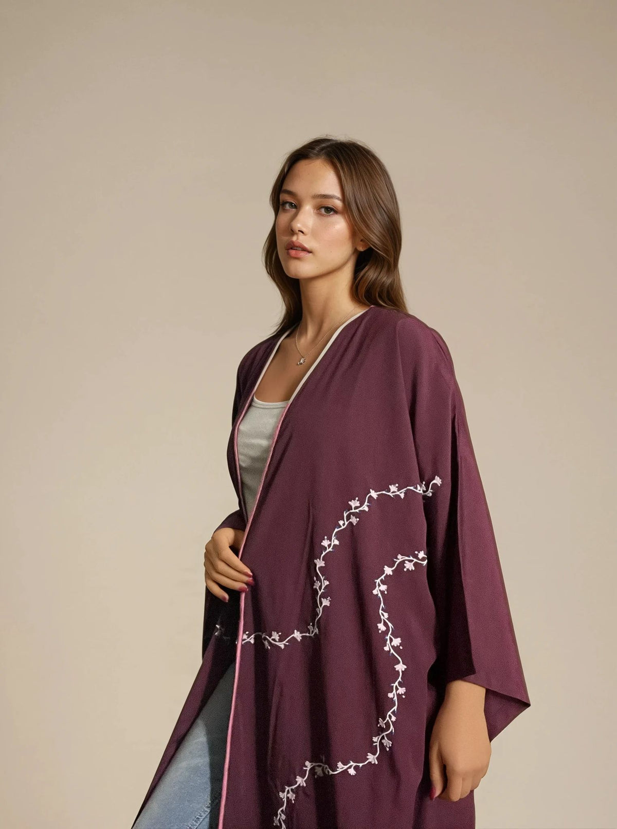 Premium abaya KSA with artistic print and flowing fabric