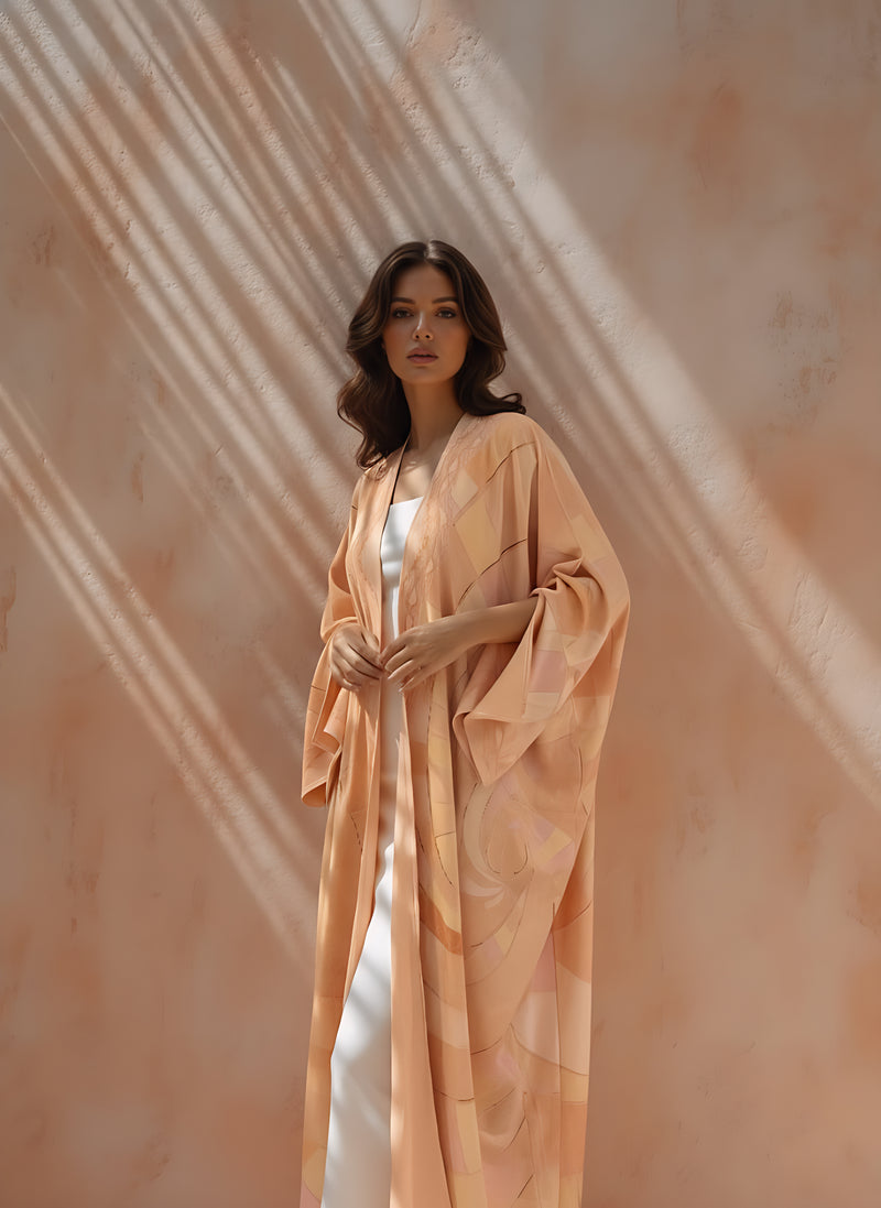Close-up of peach silk abaya texture and detailing — Blushed Without Warning from The Untitled Project.
