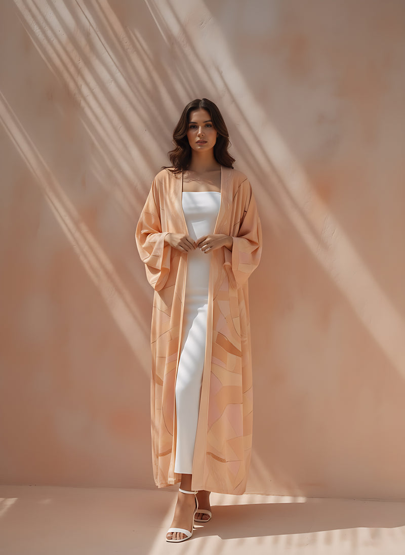 The Untitled Project Saudi — luxury printed matte silk abaya in blush peach from the Blushed Without Warning collection