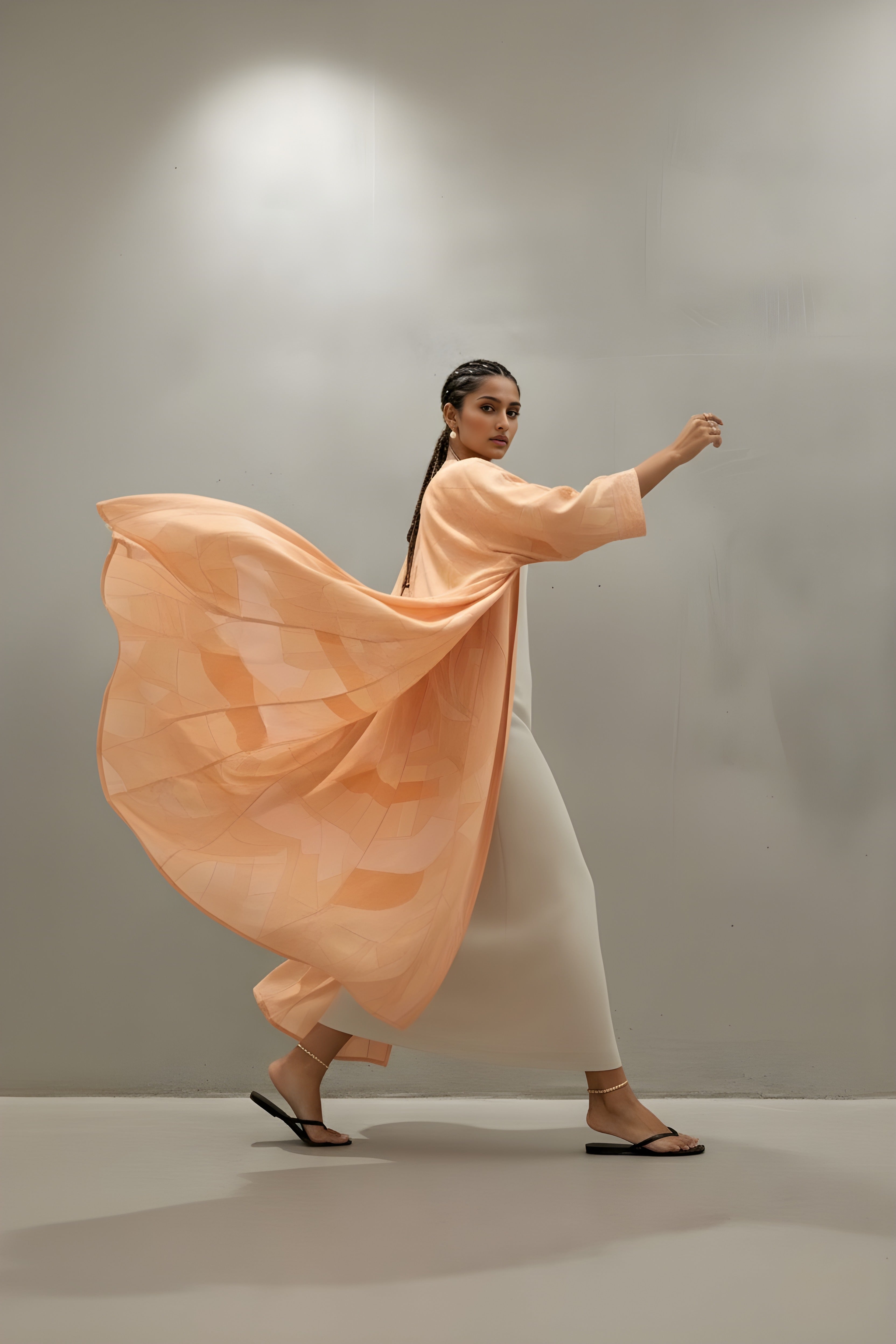 Close-up of peach silk abaya texture and detailing — Blushed Without Warning from The Untitled Project.