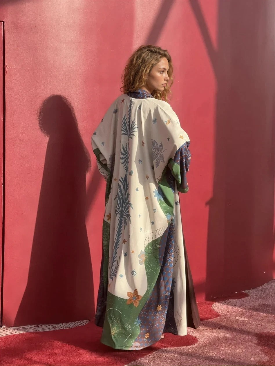 Flowing luxury abaya in motion showing silhouette and fabric movement