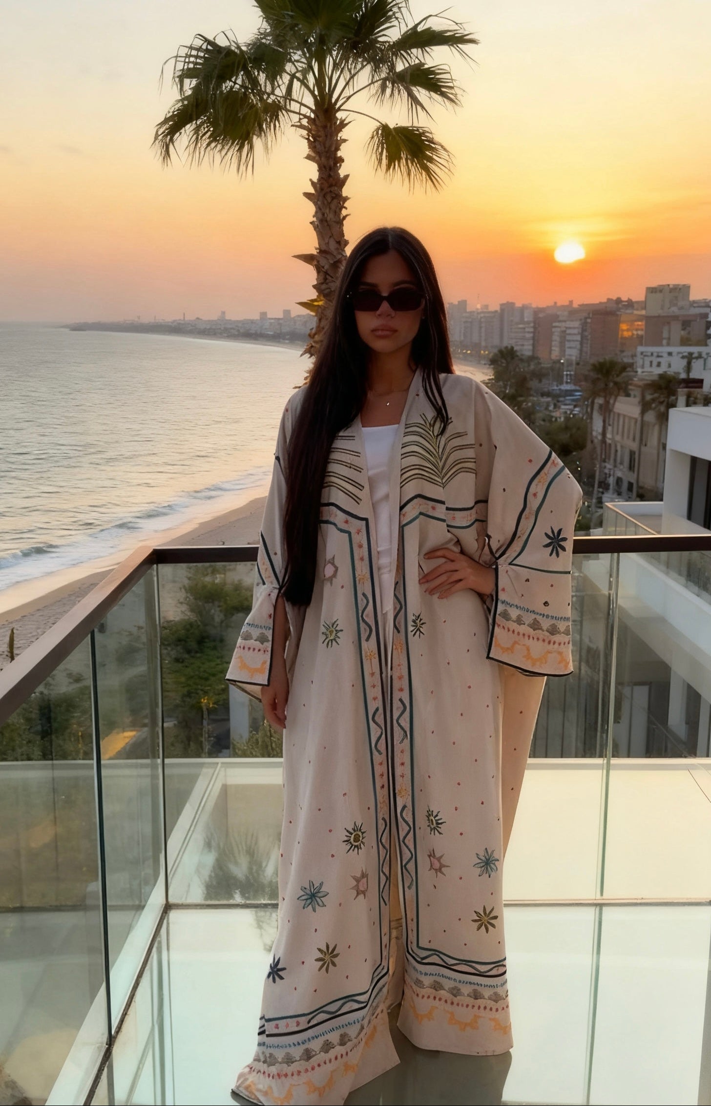 Silk printed abaya with palm tree motif and flowing silhouette