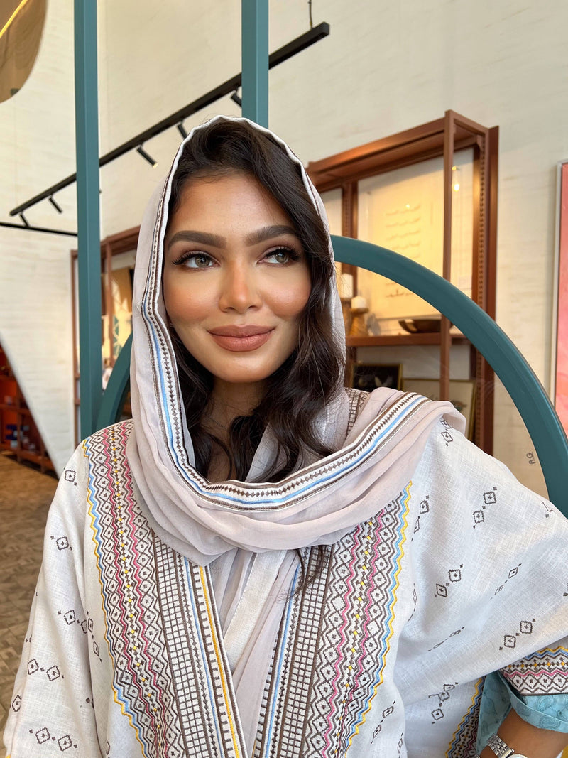 Close-up of Fatina Abaya & Scarf Set showing the scarf draped over the head and intricate boho embroidery on the front panel.
