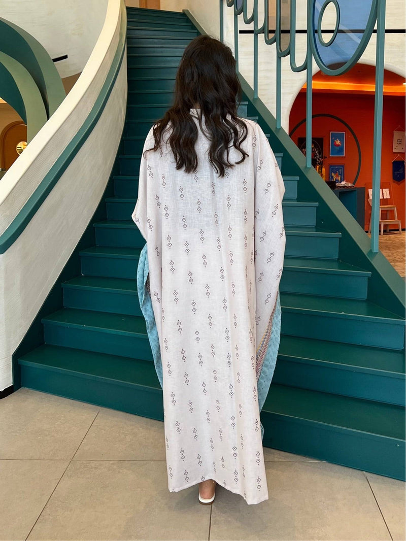 Back view of the Fatina Abaya displaying the full length and subtle embroidered patterns, ideal for traditional wear.